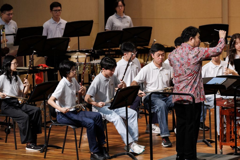 Me and my fellow orchestra mates performing at the Performing Arts Centre Concert Hall of Dunman High School